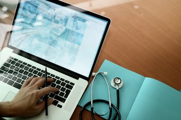 Patient accessing Telehealth services from laptop 